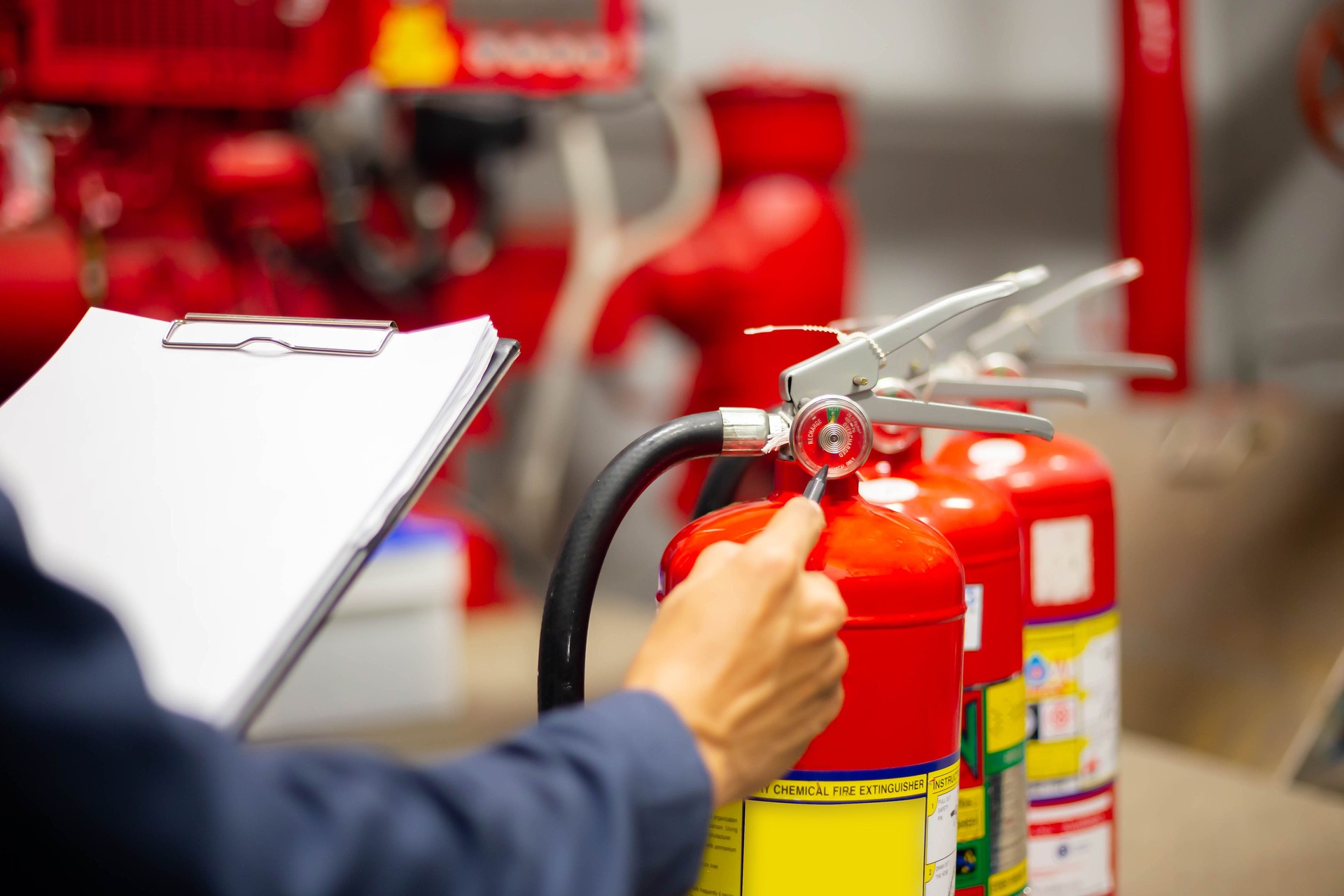 Engineer checking Industrial fire control system,Fire Alarm controller, Fire notifier, Anti fire.System ready In the event of a fire, Fire Extinguisher, Emergency Light, Fire suppresion system