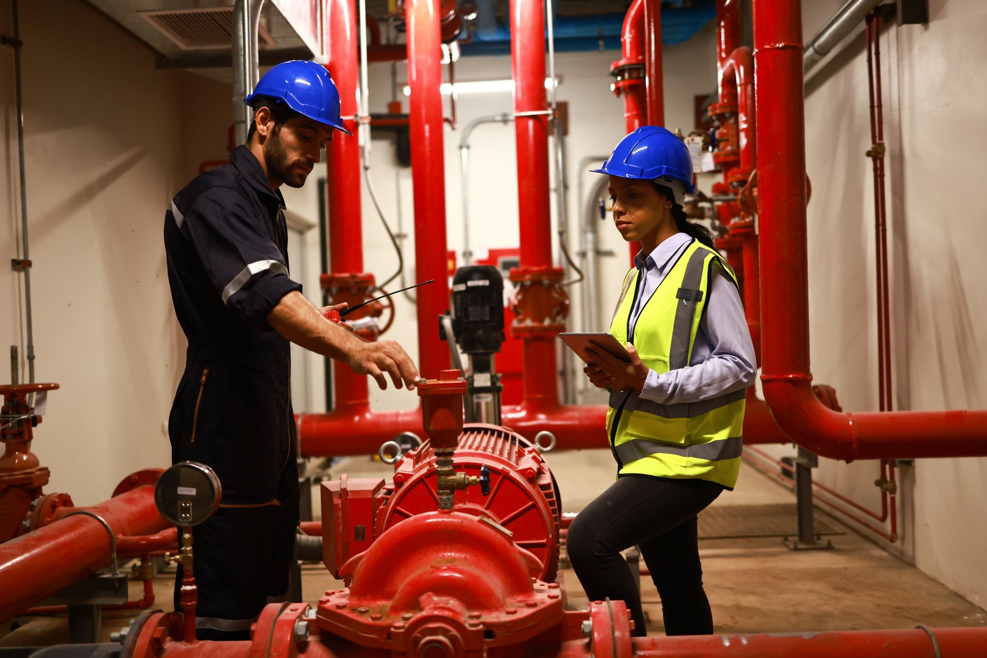 System engineer and Technician check fire Extinguishing System Piping and Pump